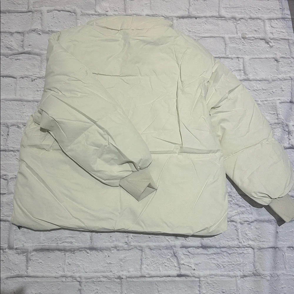 Winter Cream Cropped Puffer Jacket With a Stand up Collar. - Picture 3 of 8